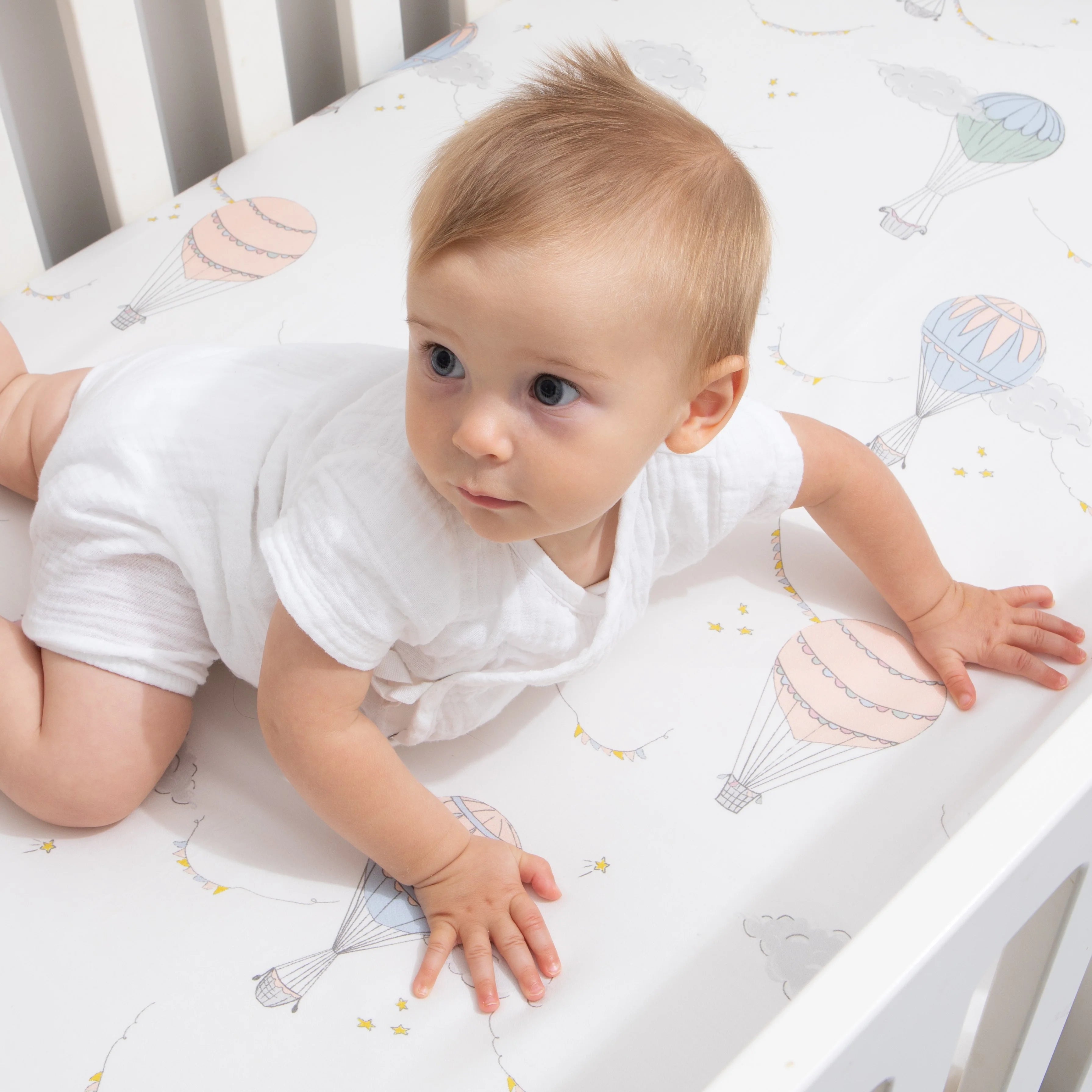 Touch The Sky Crib Sheet - Sky Pink